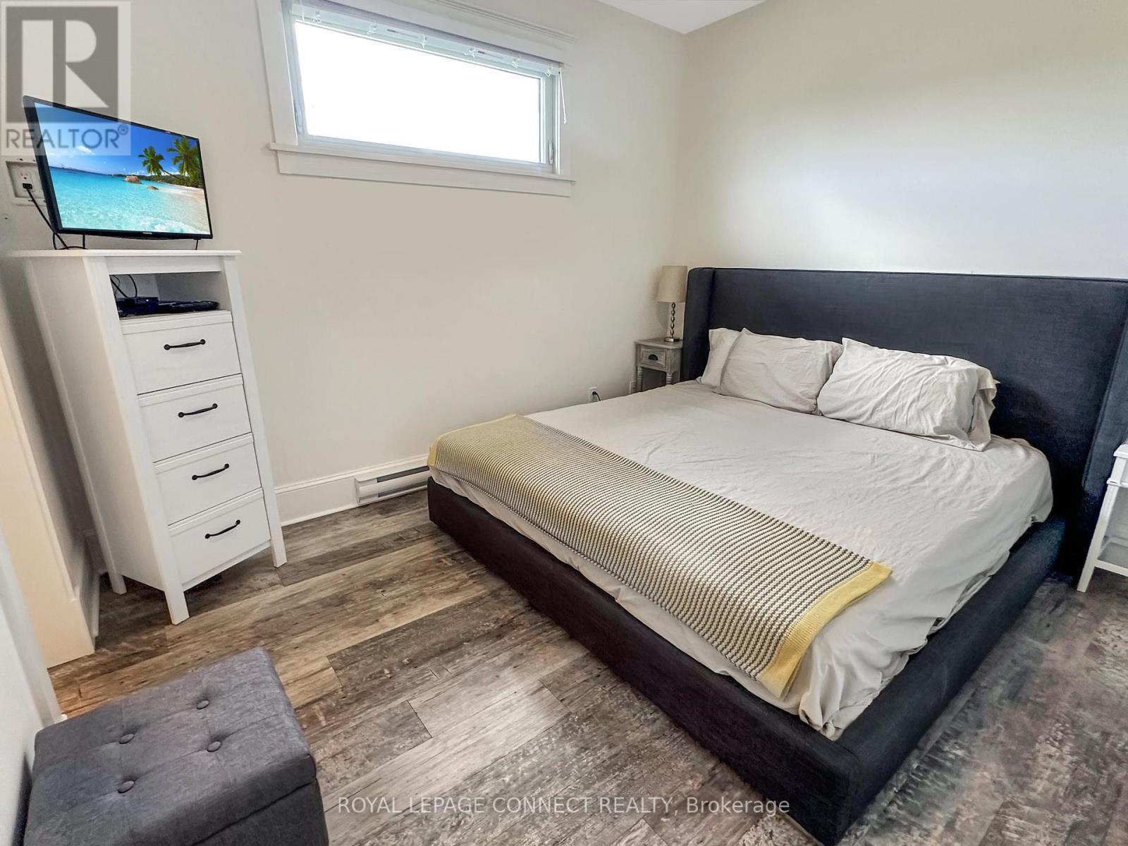 












95 - 63 BUTTERNUT LANE

,
Prince Edward County,







Ontario
K0K1P0

