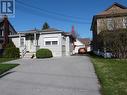 Front of home with turn around driveway