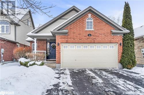 View of property featuring a garage