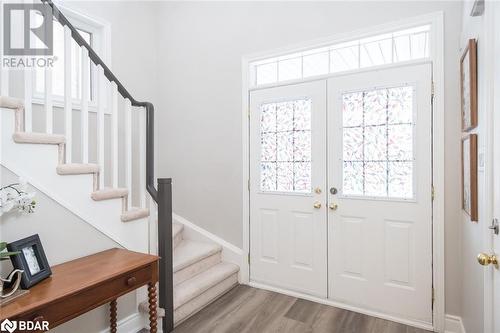 Foyer with front hall closet