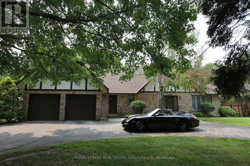 Tudor-Style Executive on a Tree-Lined Street!
