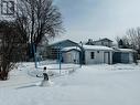 View of backyard / storage sheds