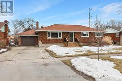 Attractive bungalow with double driveway & garage.