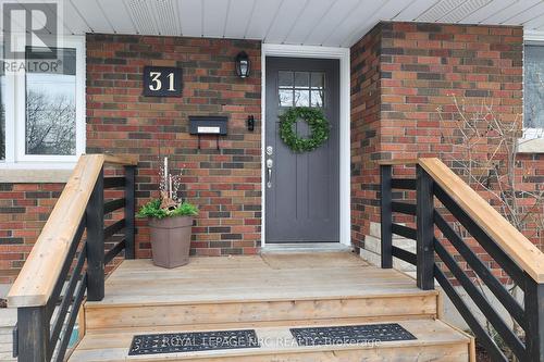 Newer front door, deck and handrails.