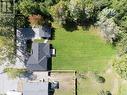 Top Aerial View w/open grass space and Back Deck