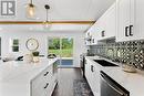 Kitchen w/view of Patio Doors leading to Back Deck