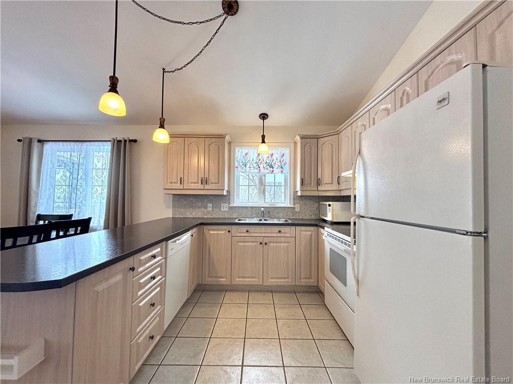 









720


Assumption

,
Bathurst,




NB
E2A 2V7

