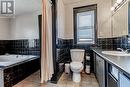 This bathroom is extra large with several closets