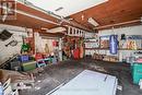 This garage is perfect for a man cave or mechanic!