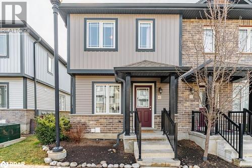 View of front of home with brick siding