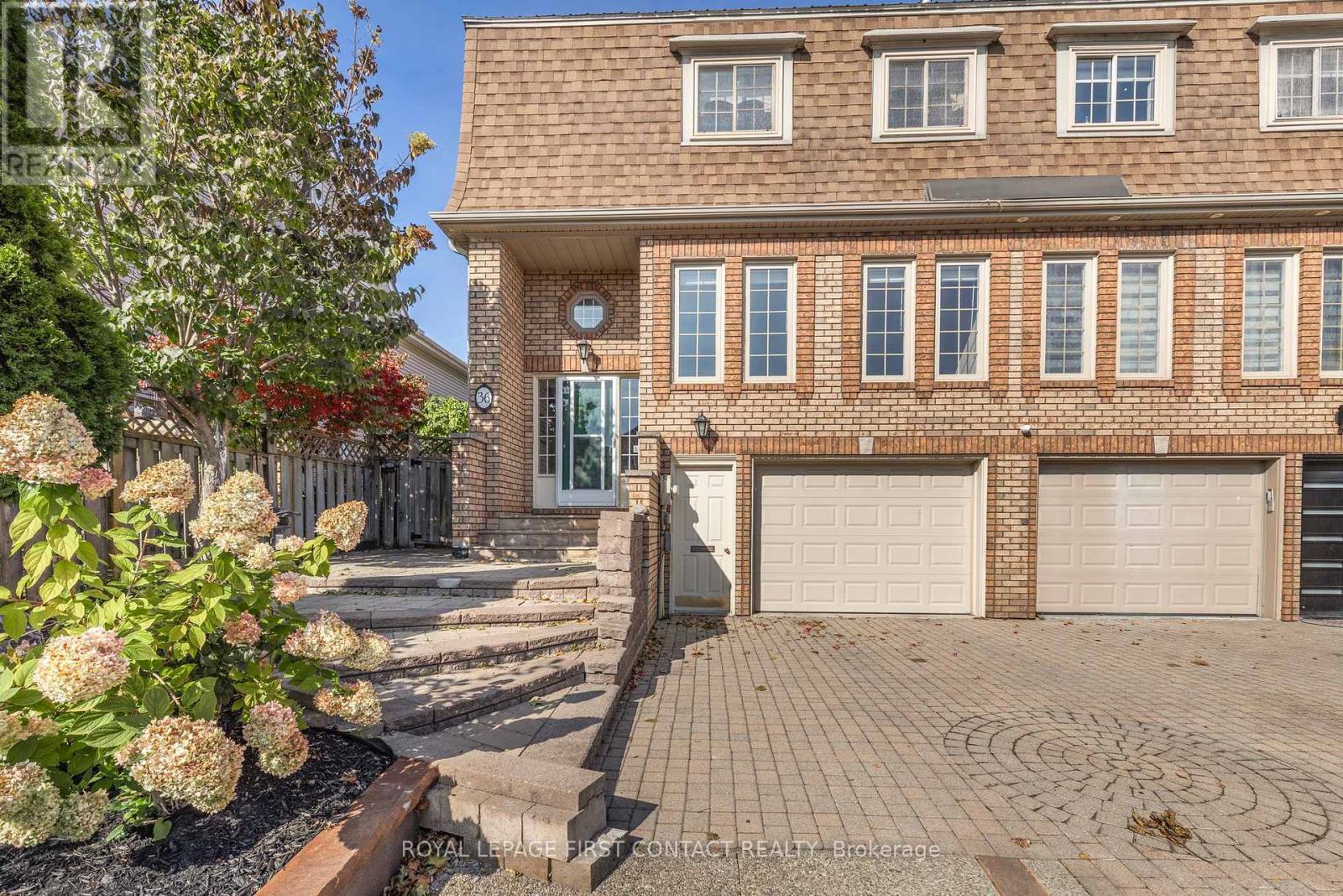 












36 KEMPENFELT DRIVE

,
Barrie,




Ontario
L4M1B9

