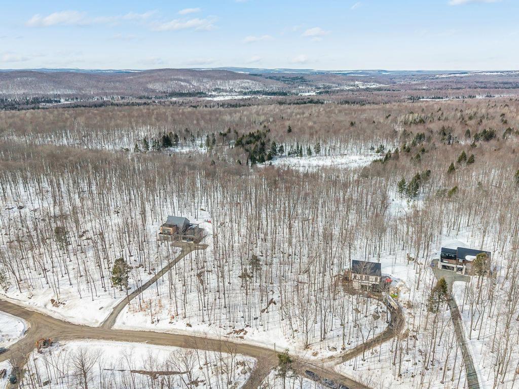 









58


Ch. de la Montagne-Cachée

,
Eastman,







QC
J0E1P0

