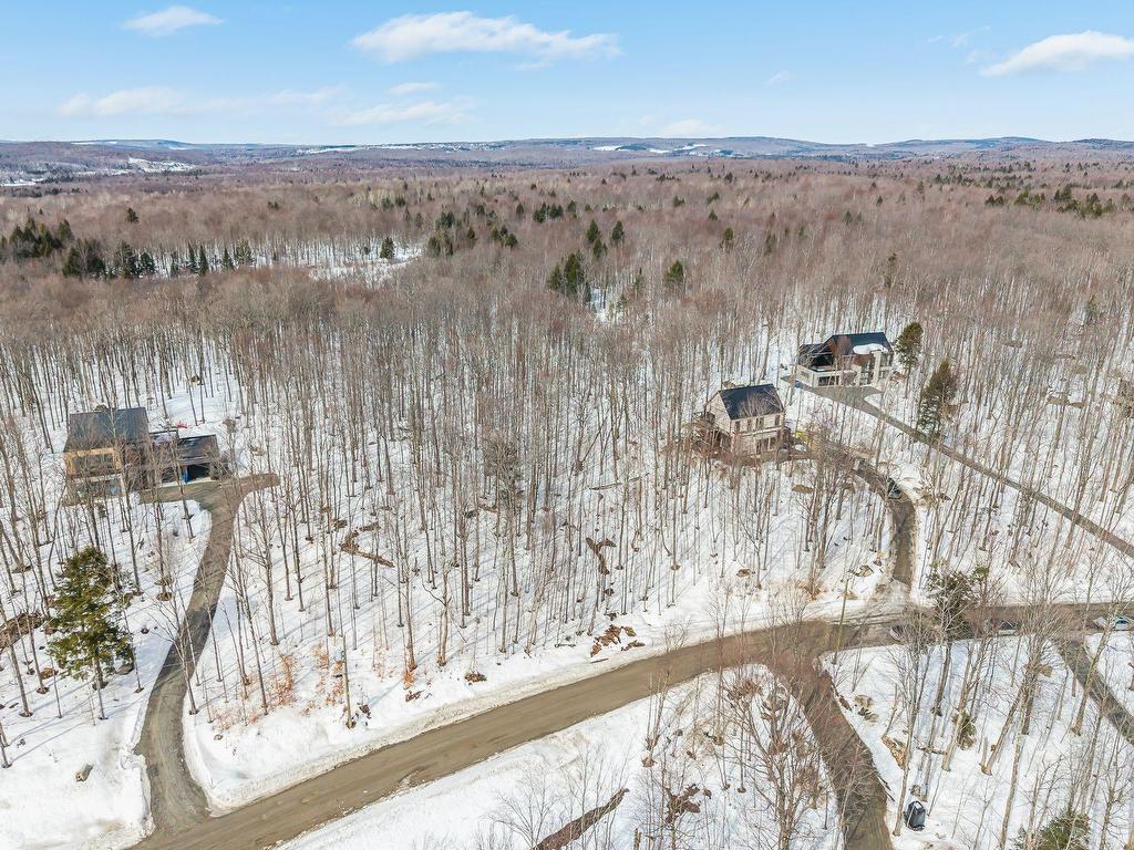 









58


Ch. de la Montagne-Cachée

,
Eastman,







QC
J0E1P0

