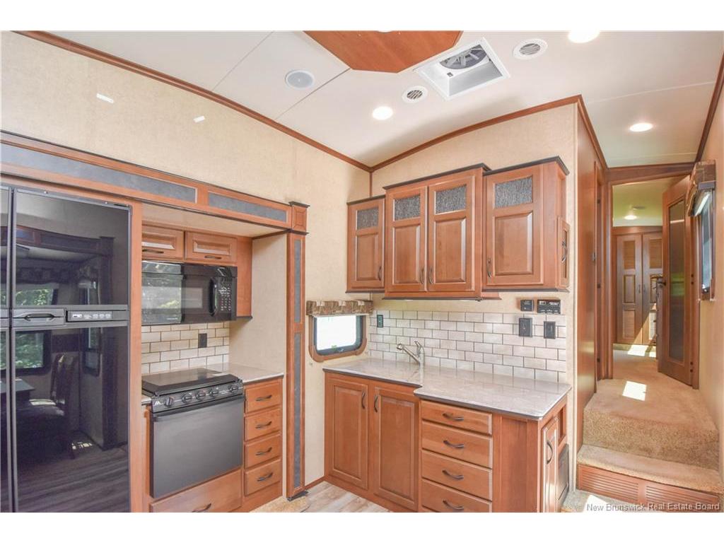 









98


des Vacanciers

LANE,
Pointe-Canot,







NB
E8T 5S1

