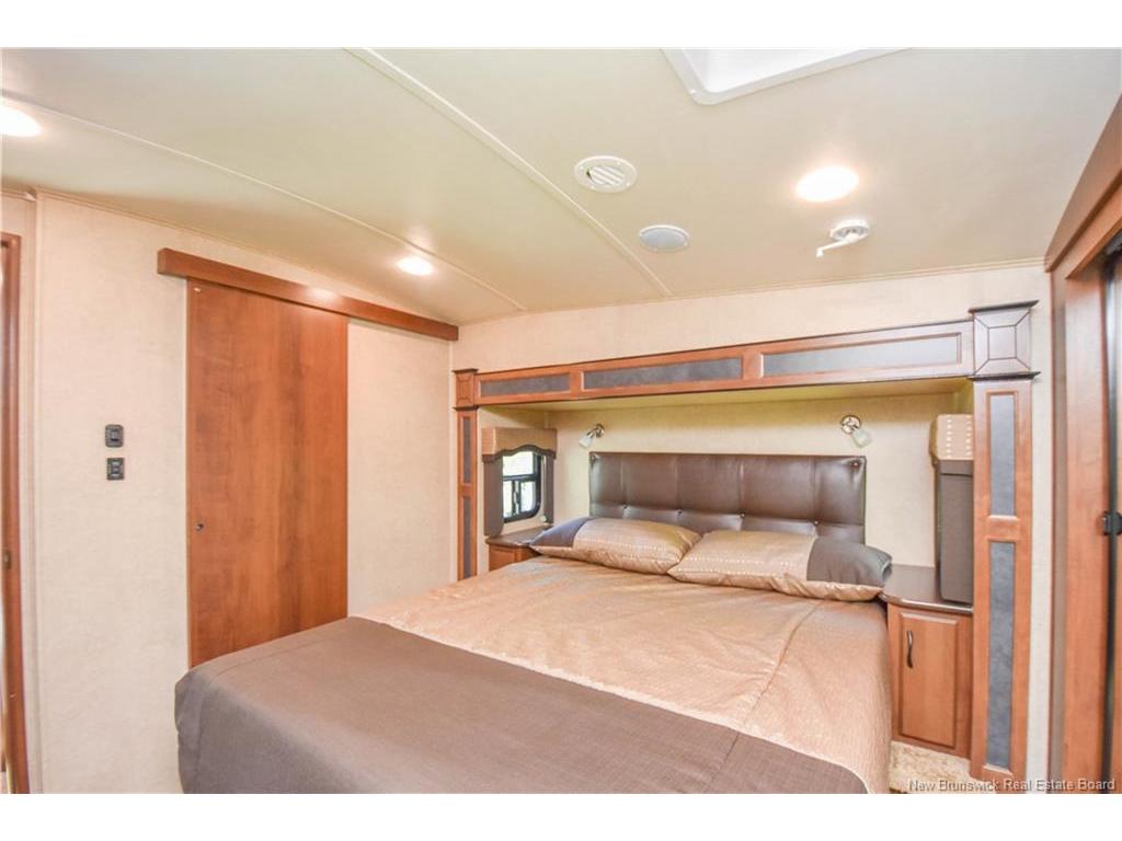 









98


des Vacanciers

LANE,
Pointe-Canot,







NB
E8T 5S1

