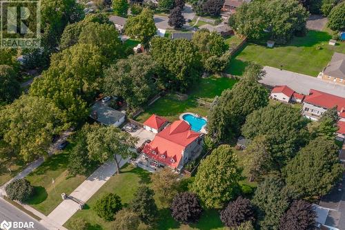 Aerial view of residential area featuring a pool area