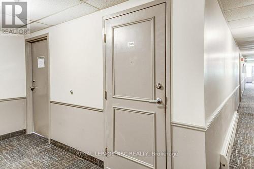 Unit door with laundry room door to the left