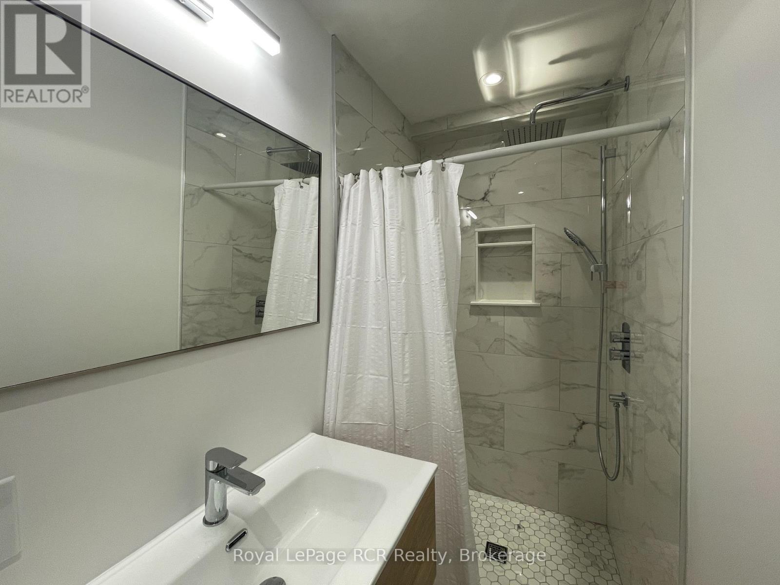 












- 1 - 61 CEDAR STREET

,
Collingwood,




Ontario
L9Y3A4

