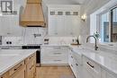 TWO TONE CABINETRY WITH CHAMPAGNE BRONZE HARDWARE