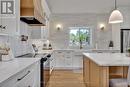 CUSTOM QUARTZ TILE BLACK SPLASH / WALL SCONCES