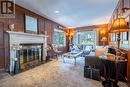 Family room overlooking the pool area features...