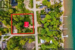 Property is a 1/2+ acre in size & fully treed.