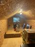 Unfinished bonus room above garage
