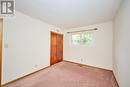 Bedroom 2 View 2 (hardwood under carpet)