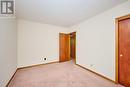 Bedroom 2 View 3 (hardwood under carpet)