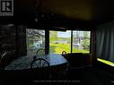 view of lake from sunroom