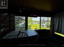 view of lake from sunroom