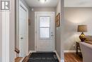 Inside entrance with newer exterior door