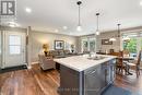 Remodelled kitchen with island & quartz counters