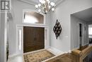 Grand foyer entrance with double door entry