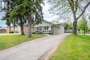 With mature trees & ample parking