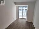 Living room facing sliding doors to balcony