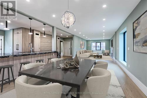 Virtually Staged Main Floor Dining Room/Living Roo