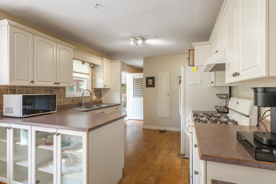 









405


Macaden

Court,
Kelowna,




BC
V1X 2V1

