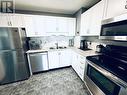 4 Stainless Appliances Includec.