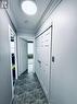 Hallway to Both Bedrooms and Laundry Room.