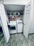 Double Doors hide NEW Washer and Dryer, Included.