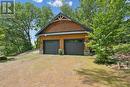 Garage plus separate entrance for snowmobiles