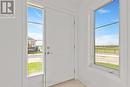 Back door entrance off of driveway, main floor