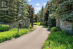 Nestled on 2.5 Acres Behind Private Gates!