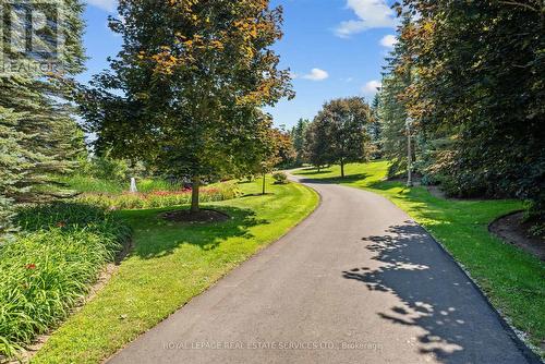 Located in Prestigious Whispering Pines Estates!