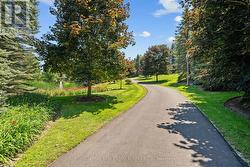 Located in Prestigious Whispering Pines Estates!