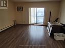 Living room with patio door to covered terrace