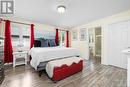 Primary bedroom with walk-in closet and ensuite