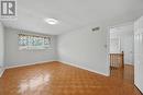 Primary Bedroom w/Parquet Floor & Walk-In Closet