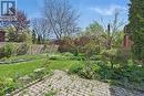 Fenced Backyard w/Interlock Patio and Lush Gardens